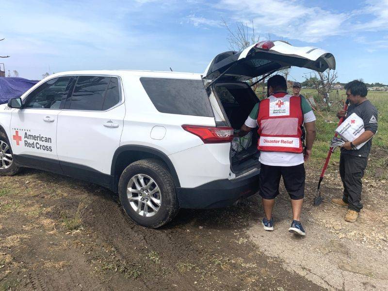 volunteer unloading vehicle